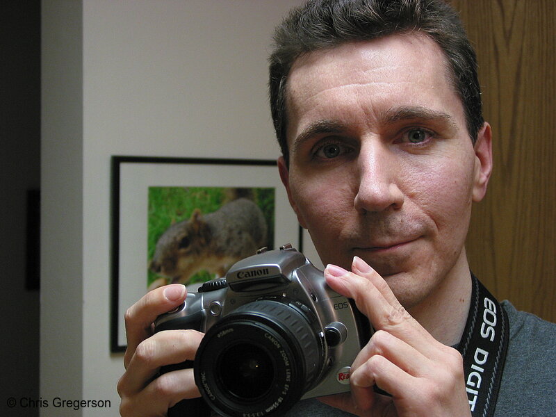 Photo of Photographer Posing with Digital Camera(5446)