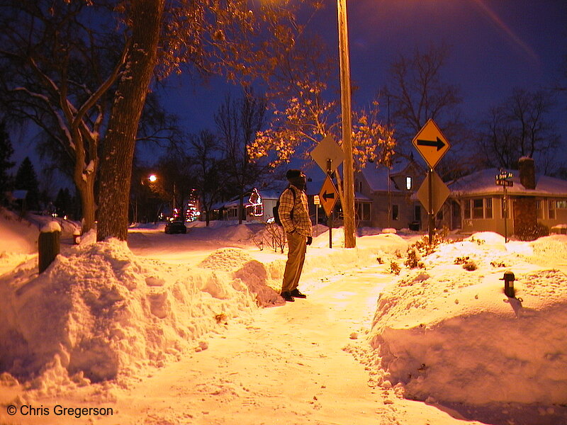 Photo of Chris and snowbanks under a streetlight(1408)