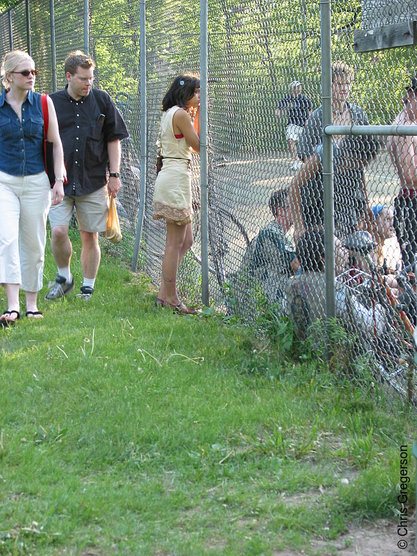 Photo of Girl Against Fence(2034)