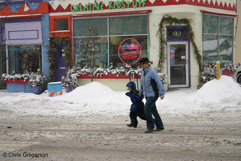 Photo of Storefront, Woman and Child Crossing Street(3071)