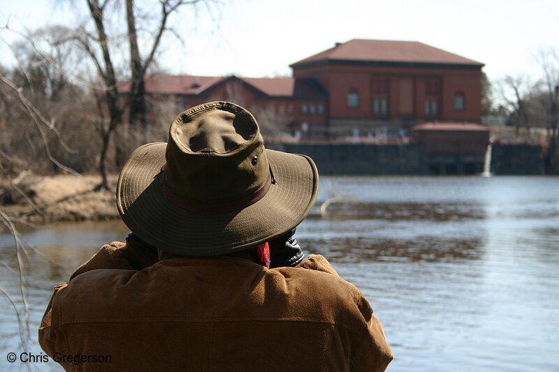 Photo of Man Facing Water Treatment Plant on the Mississippi River(3135)