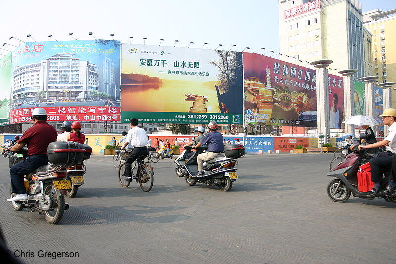 Photo of Scooters and Bicycles in Intersection(4241)