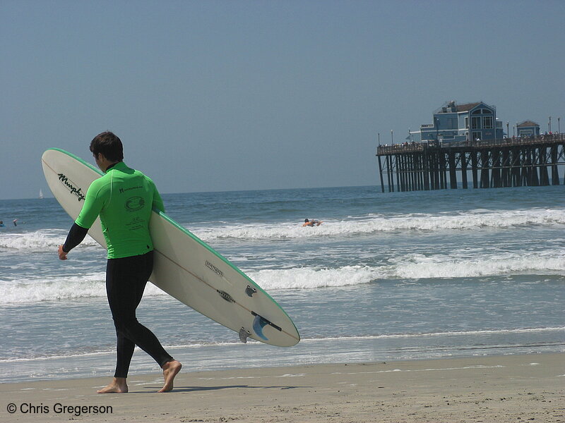 Photo of Man Heading out to Surf, Oceanside(4301)