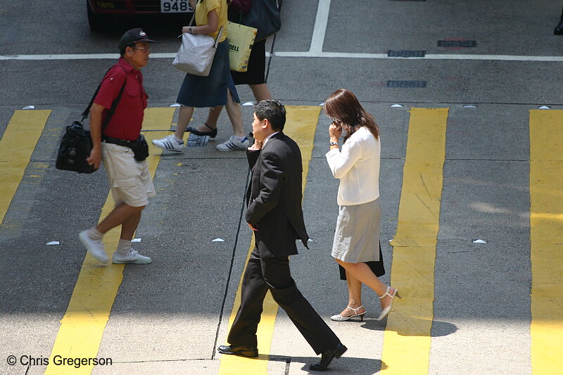 Photo of Businessman on Cell Phone in Crosswalk, Hong Kong(4419)