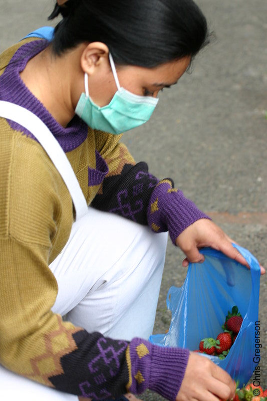 Photo of Woman Selling Strawberries in Surgical Mask(4448)