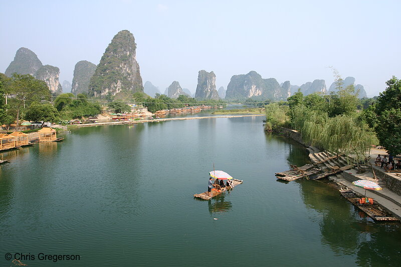 Photo of Steep Mountain Peeks along a River in China(4626)