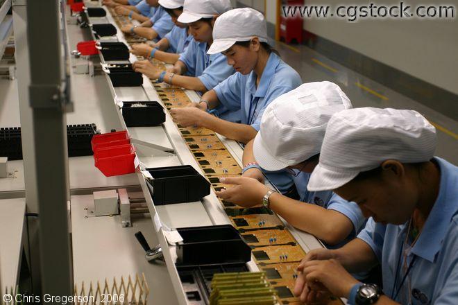 Photo of Young Female Workers on an Assembly Line(4892)