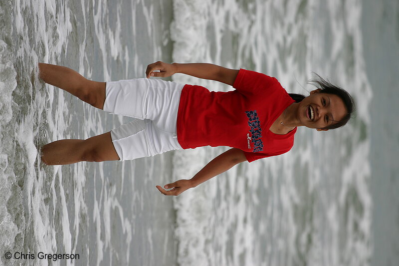 Photo of Young Woman Playing in the Ocean(4974)