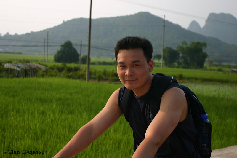 Photo of Chinese Tourist Riding Bicycle(5071)