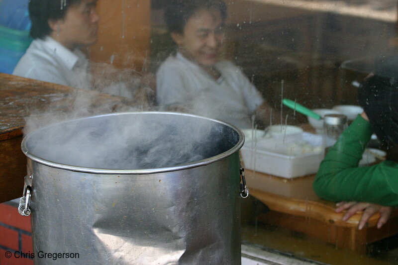 Photo of Steaming Pot and Diners in a Chinese Restaurant(5090)