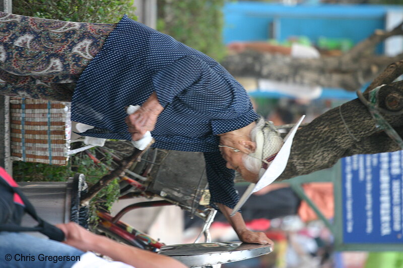 Photo of Elderly Chinese Woman Rummaging in Trashcan(5109)