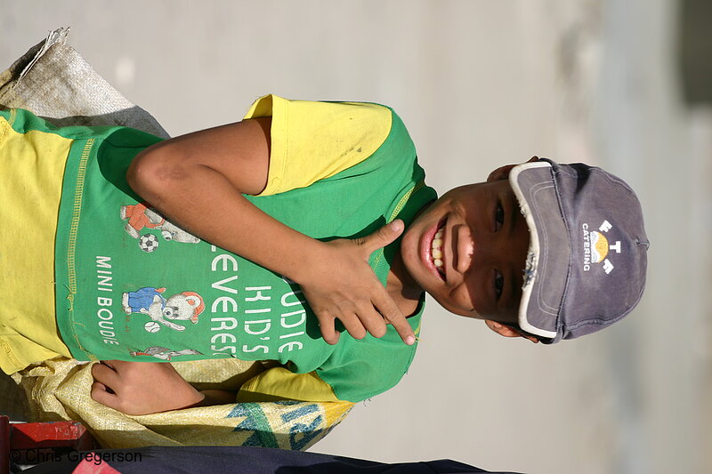 Photo of Boy Flaunting His Face Wearing a Green Shirt(5278)