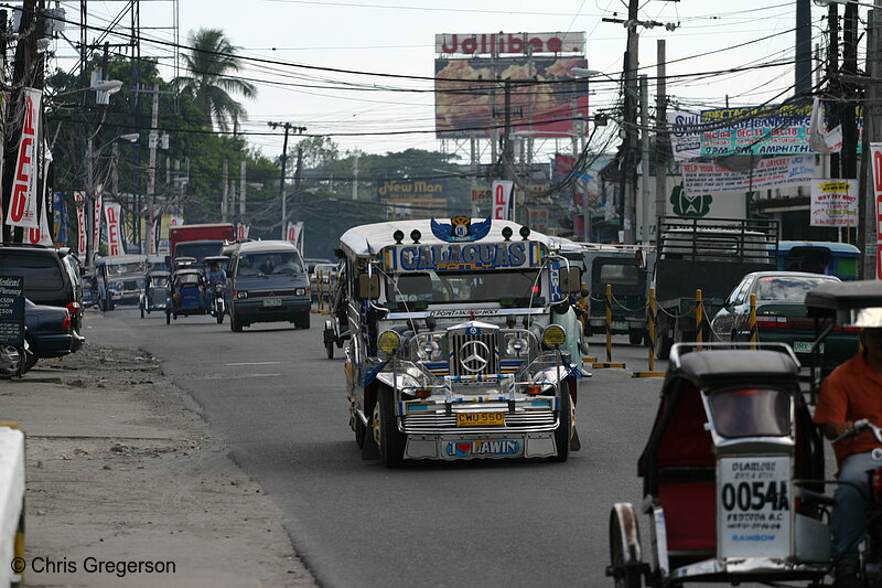 Photo of MacArthur Highway and a Jeepney, the Common Public Transportation in the Philippines(5360)