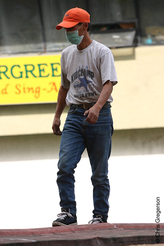 Photo of A Worker Wearing a Surgical Mask Due to Meningococcemia Epidemic in Baguio City, Philippines(5754)