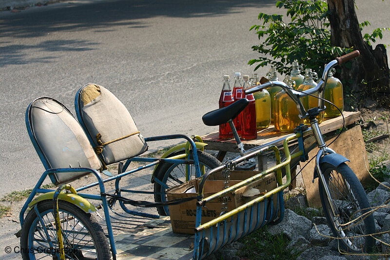 Photo of For Sale:  Petroleum Products in Recyled Softdrink and Wine Bottles(5845)