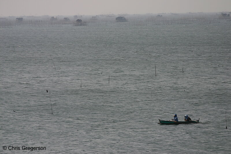 Photo of Fishermen on Boat in Manila Bay, Philippines(6082)