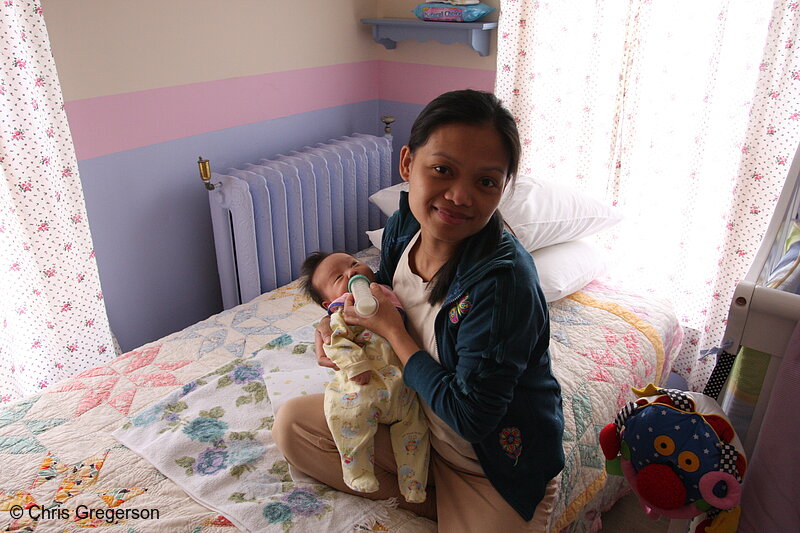 Photo of Mom Feeding Newborn in Nursery(6777)