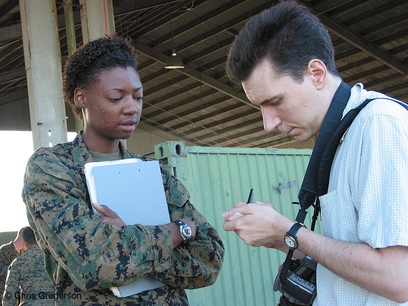 Photo of Photographer Taking Notes from Marine Public Information Officer, Philippines(7516)