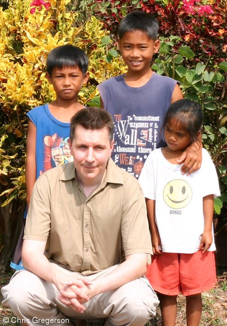 Photo of Giovani, Levin, Chris, and Maureen in Barangay Las Ud(8142)