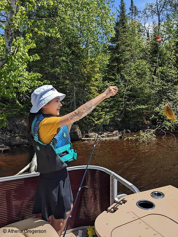 Photo of Clio Catching her First Fish(8455)